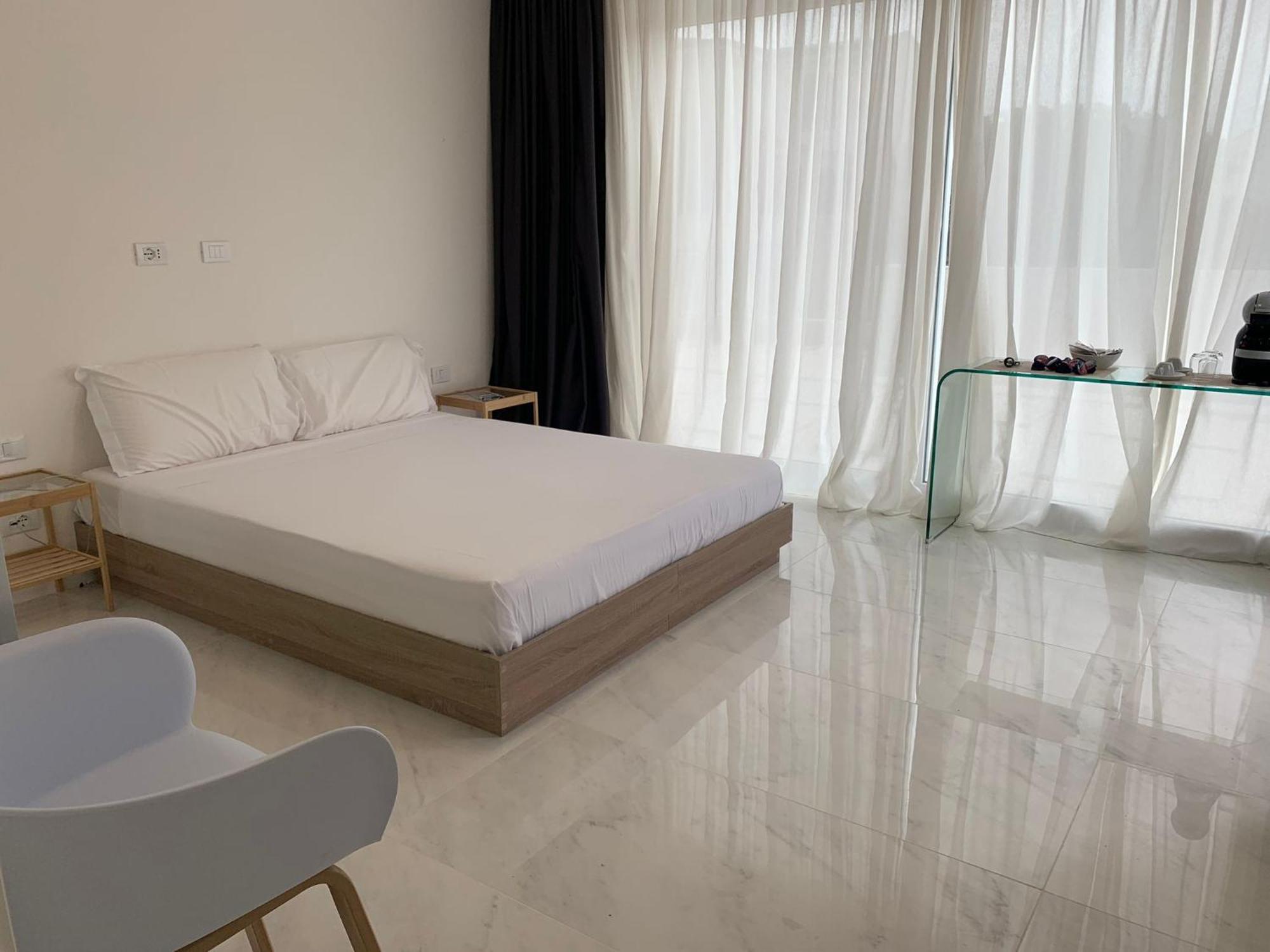 Smart Luxury Suites & Apartments Orosei Phòng bức ảnh